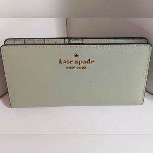 New W/ Tags Kate Spade Staci Large Slim Bifold Wallet. Color sage